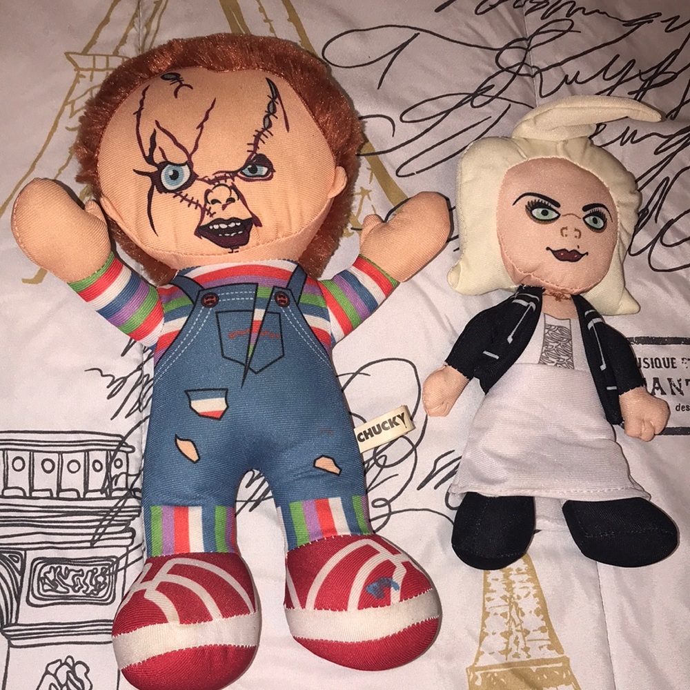 Chucky doll and bride of Chucky’s wife teddy bear